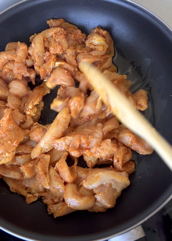 4. Cook the Chicken
Heat a skillet or grill pan and cook chicken strips until golden brown and fully cooked. Garnish with chopped parsley.