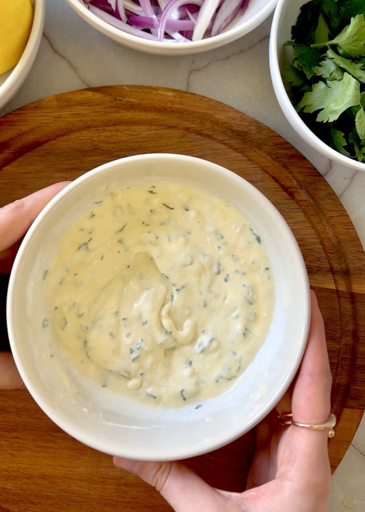 Prepare the Garlic Sauce
Combine yogurt, mayonnaise, garlic, and parsley until smooth. Adjust garlic to your taste.