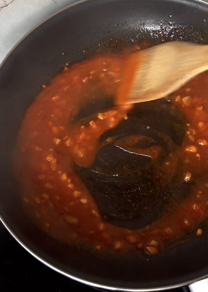Prepare the sauce: Melt butter, sauté garlic, then add soy sauce, paprika, honey, sriracha, and water. Simmer until thickened.
