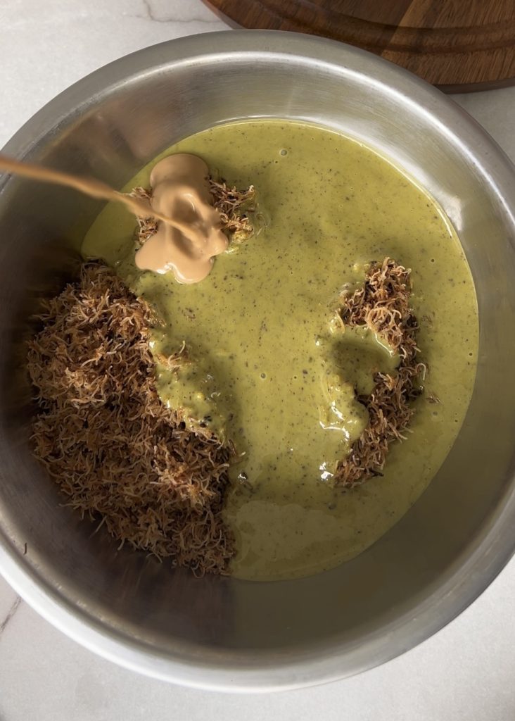 Prepare the Filling
 Cut kunefe into small pieces and cook with butter until golden. Mix with pistachio cream and tahini until smooth and combined.