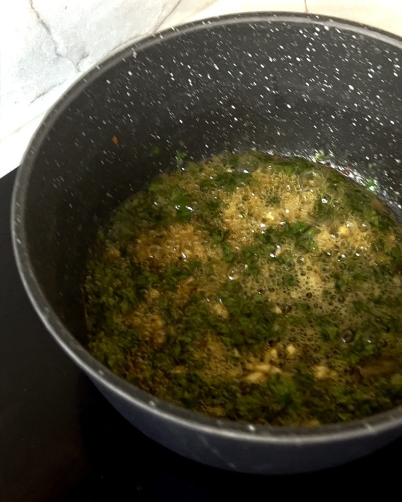 Prepare the Sauce
In a saucepan, melt the butter gently. Add garlic, chili flakes, fresh parsley, parmesan, and a pinch of salt. Stir until well combined and fragrant.
