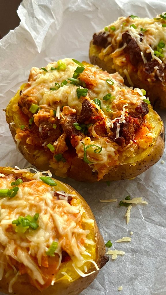 Cheesy Beef Stuffed Baked Potatoes with Creamy Onion Sauce