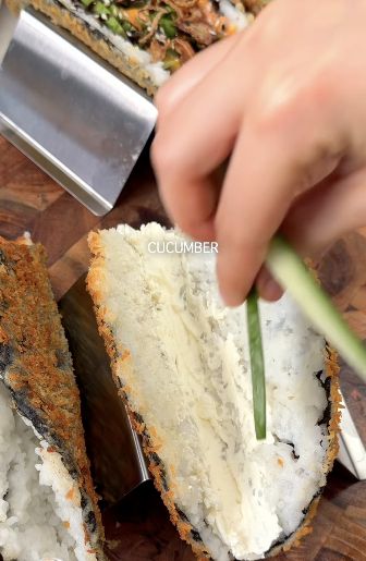 Add cucumber and fillings to the crisp taco shells