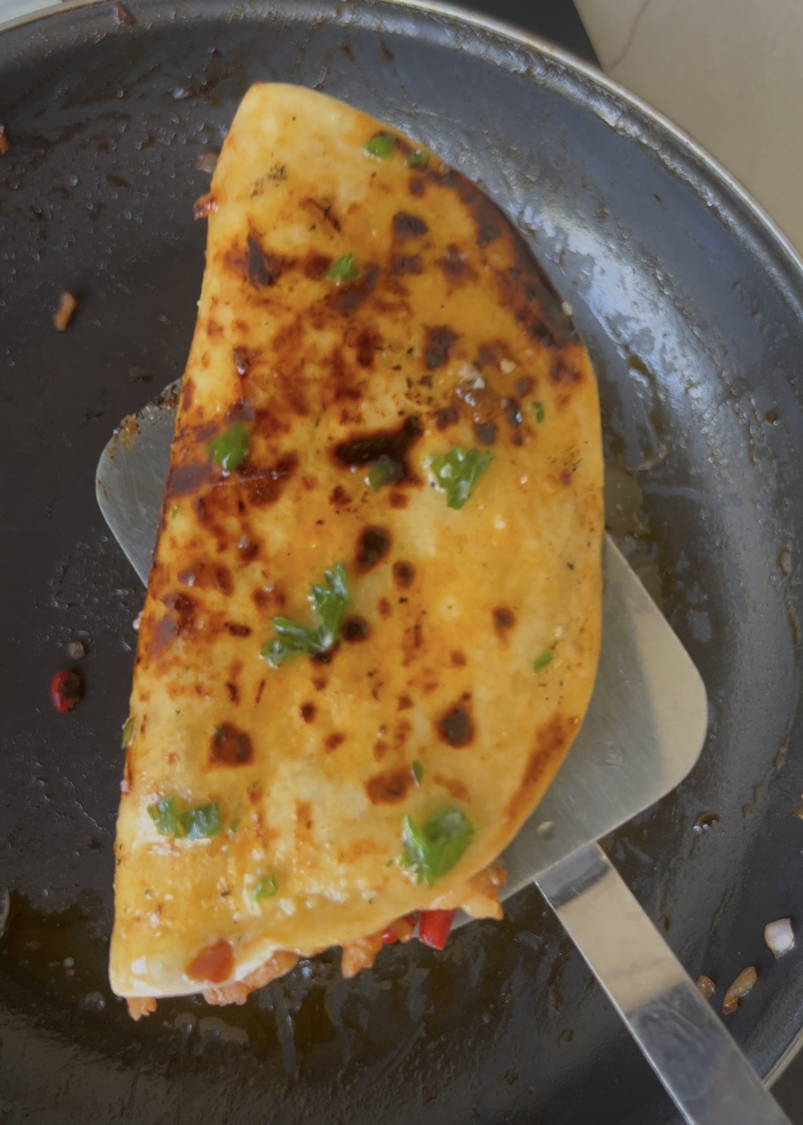 Chicken tacos toasted in garlic parsley butter