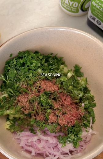 Combine cucumber, red onion, parsley and sumac