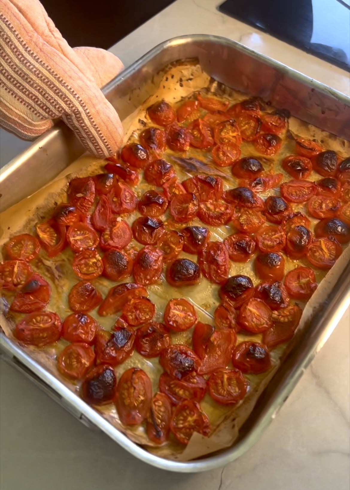 Cherry tomatoes roasted until soft and lightly charred