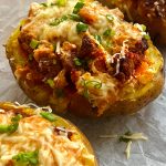 Cheesy Beef Stuffed Baked Potatoes with Creamy Onion Sauce