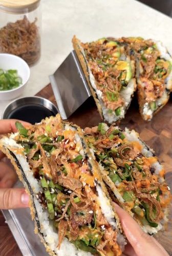 Crispy sushi tacos filled with spicy tuna and avocado