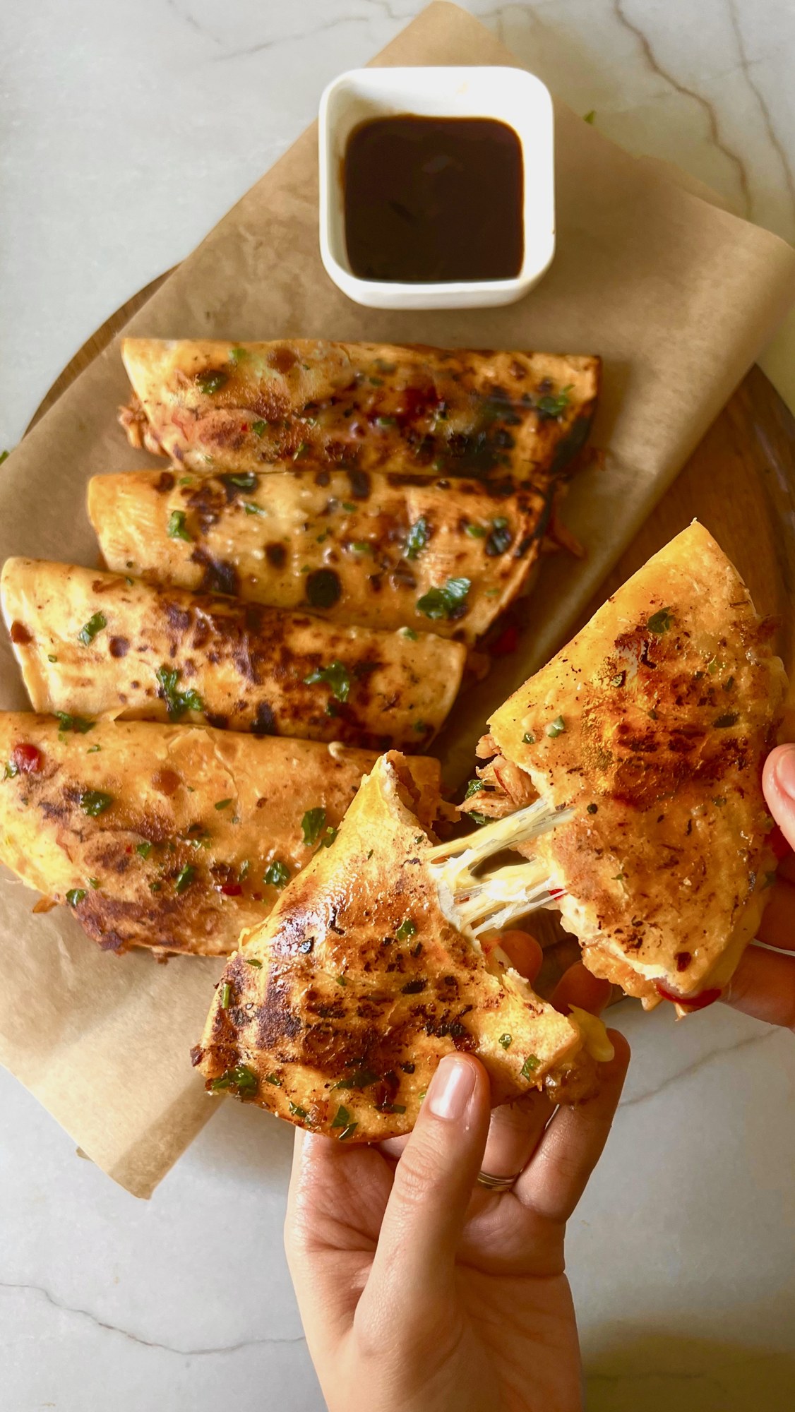 Crispy honey BBQ chicken tacos with melted cheese