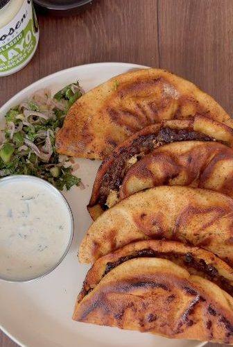 Golden beef kofta tacos with cucumber salad and garlic sauce