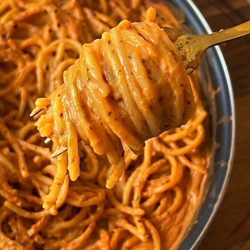 Pasta coated in creamy roasted tomato and ricotta sauce