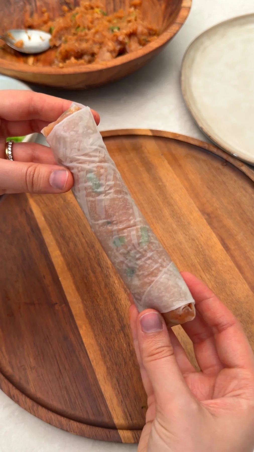 Seasoned chicken wrapped in a rice paper roll